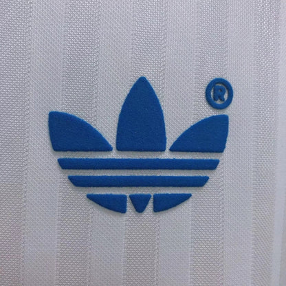 Blue Adidas logo on a white Marseille 90/91 home shirt