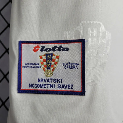 Lotto logo on a Croatia 1998 home shirt  with text in Croatian