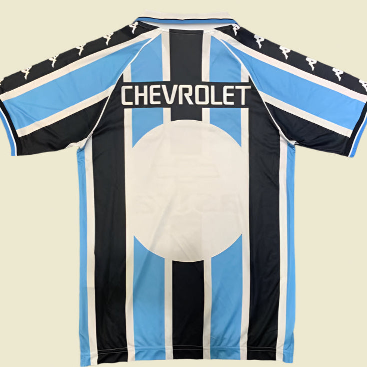 Gremio 2000 home shirt  with Chevrolet logo on a gray background