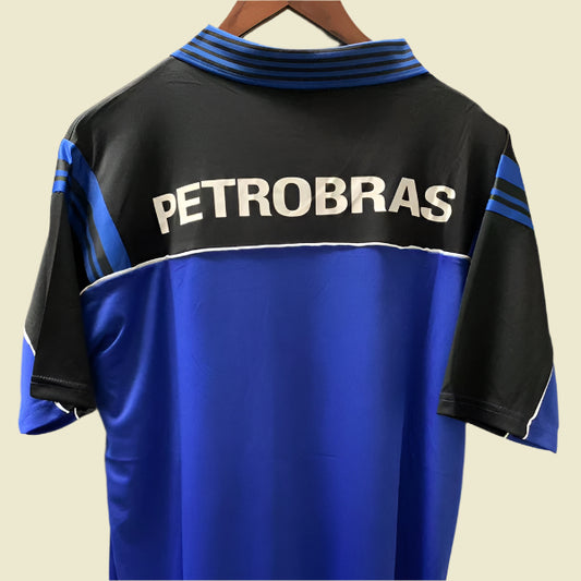 Blue Flamengo 1999 gk home shirt with 'PETROBRAS' logo on a plain background
