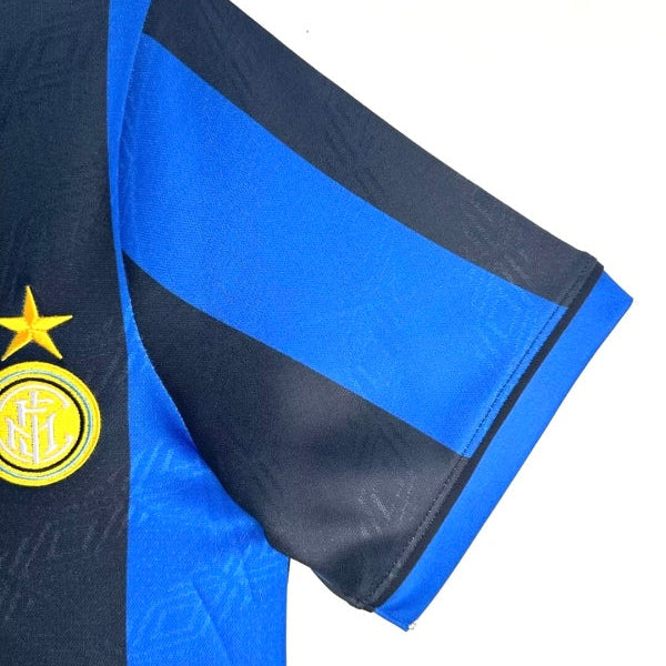 Close-up of a Inter Milan 95/96 home shirt  with a star and logo on a white background