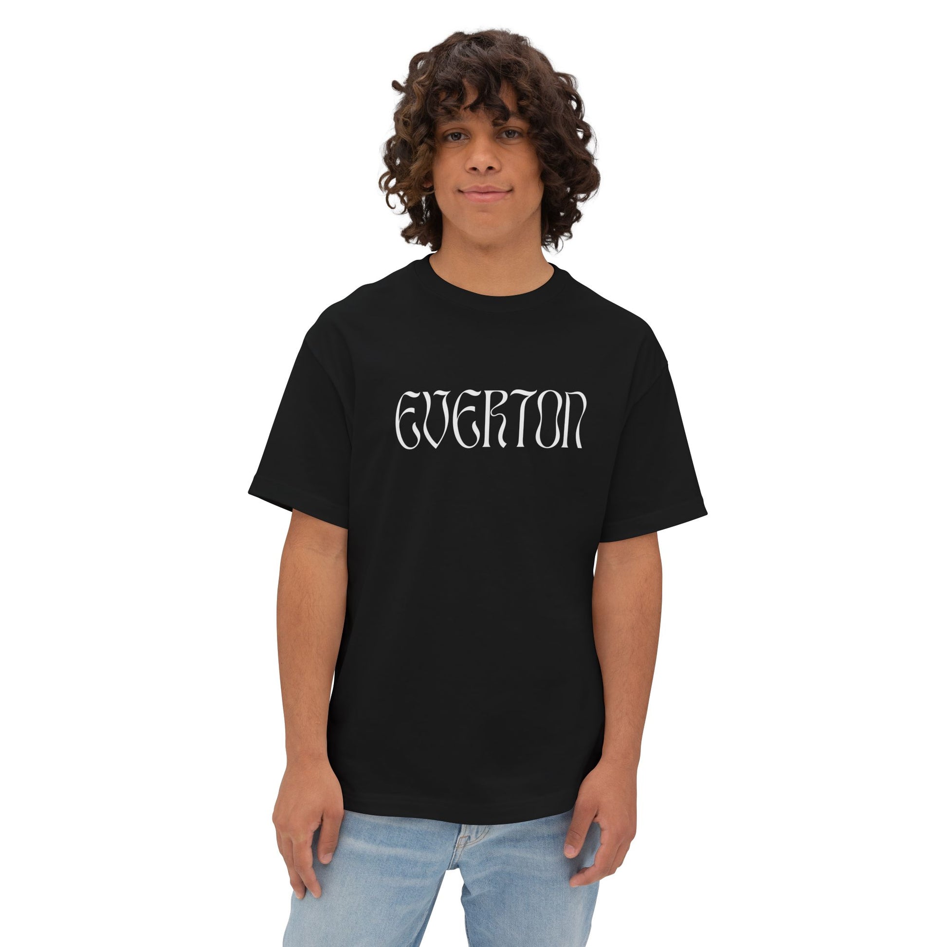 Person wearing a black t-shirt with 'Everton' text on a white background
