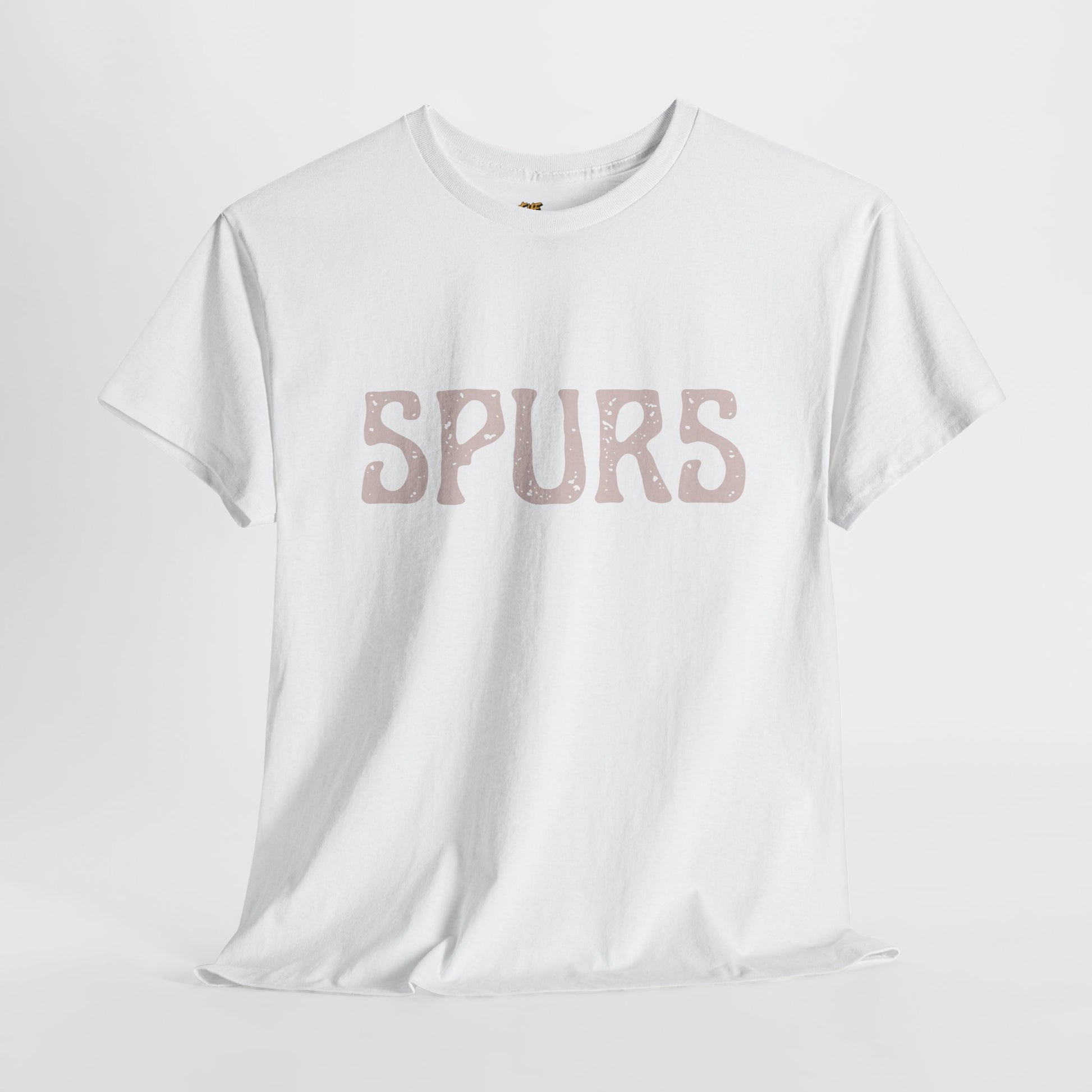 White t-shirt with 'SPURS' printed on it against a light gray background