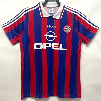 Red and blue striped Bayern Munich 95-97 home shirt with Adidas and Opel logos on a white background