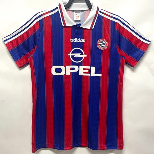 Red and blue striped Bayern Munich 95-97 home shirt with Adidas and Opel logos on a white background