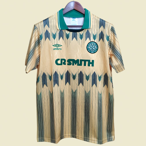 Celtic 89-91 away shirt with brand logos on a dark background