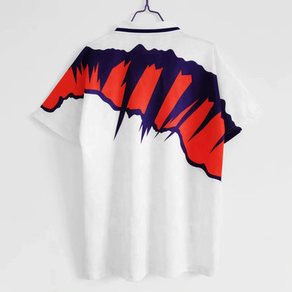 White scotland 1992 away shirt with red and purple abstract design on a white background