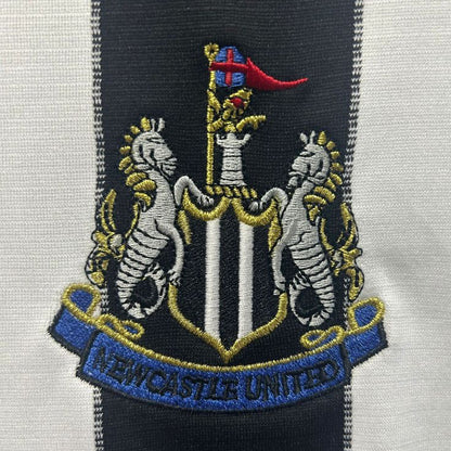 Embroidered crest of Newcastle United on a Newcastle 00/01 home shirt