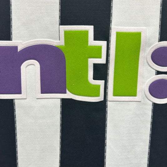 Colorful 'ntl' logo on a striped Newcastle 00/01 home shirt