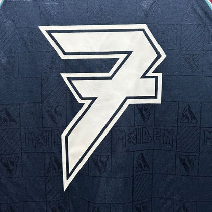 Navy blue West Ham 1999 iron maiden home shirt  with a white logo