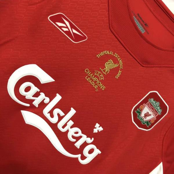 Red Liverpool 2005 champions league final shirt  with visible branding on a white background