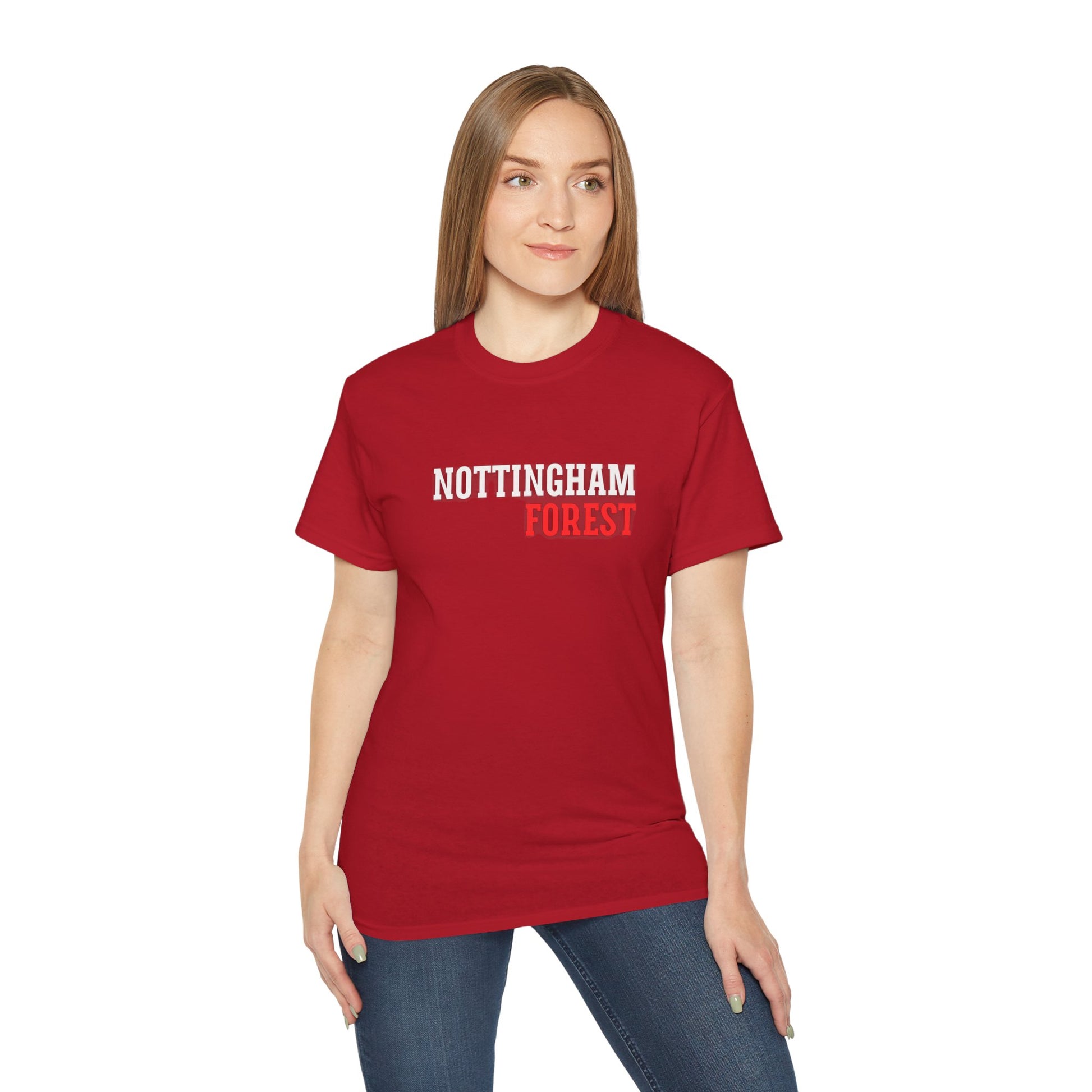 Person wearing a red t-shirt with 'Nottingham Forest' text on a white background