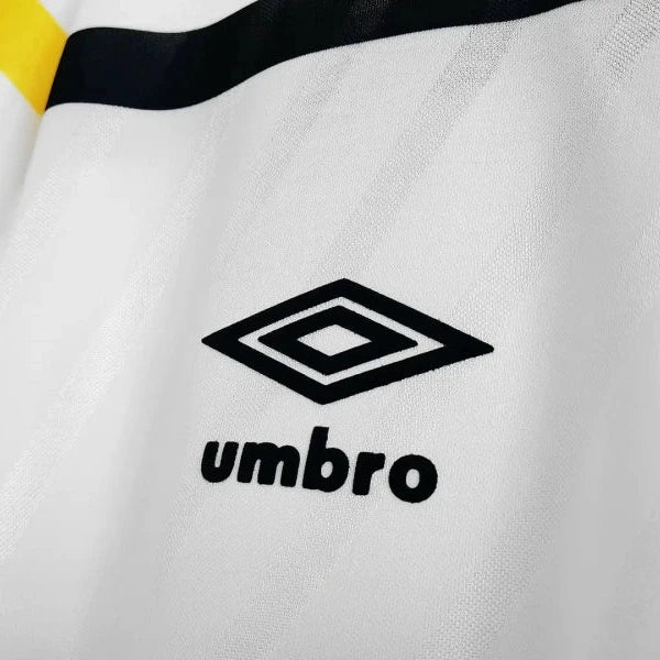 Umbro logo on a Scotland 1988 away shirt with black, yellow, and white design.