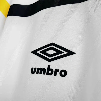 Umbro logo on a Scotland 1988 away shirt with black, yellow, and white design.