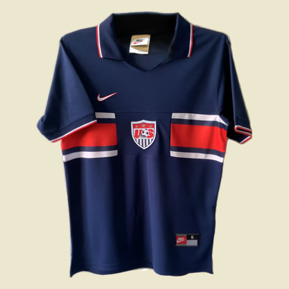 Navy blue USA 1995 home shirt with red and white accents on a white background