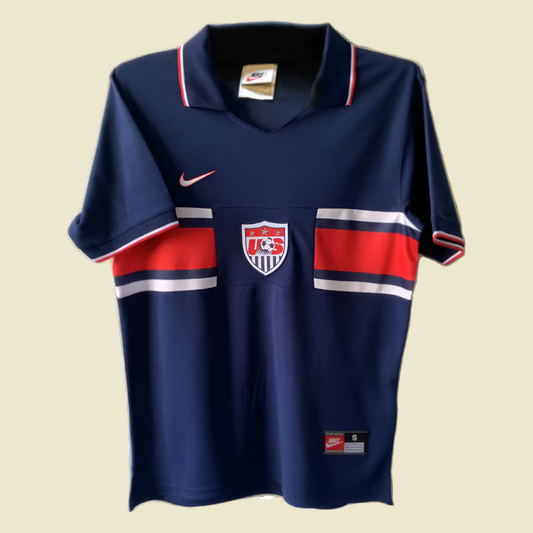 Navy blue USA 1995 home shirt with red and white accents on a white background