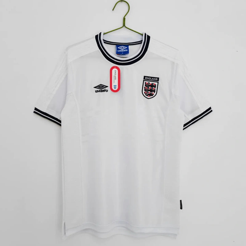 White England 2000 home shirt with black accents on a hanger against a white background