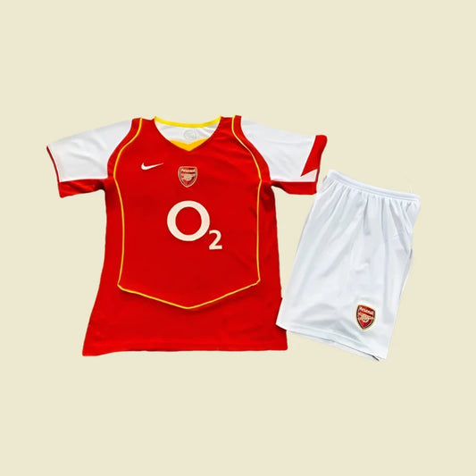 Red arsenal 04/05 home kids kit with white accents and a logo on a white background
