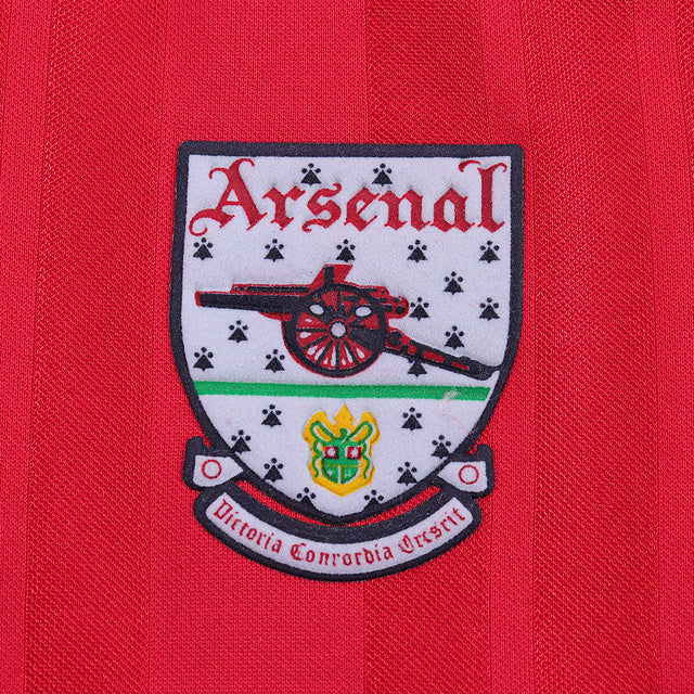 Arsenal logo on a red Arsenal 92-94 home kids kit