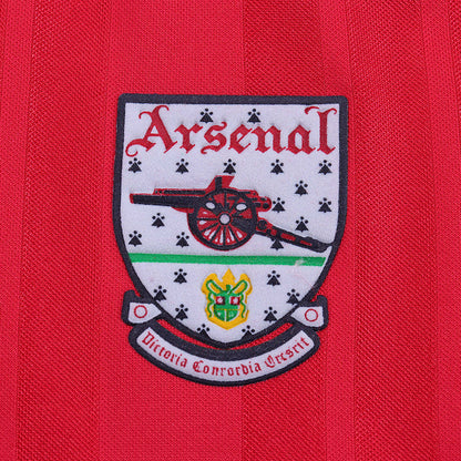Arsenal logo on a red Arsenal 92-94 home kids kit