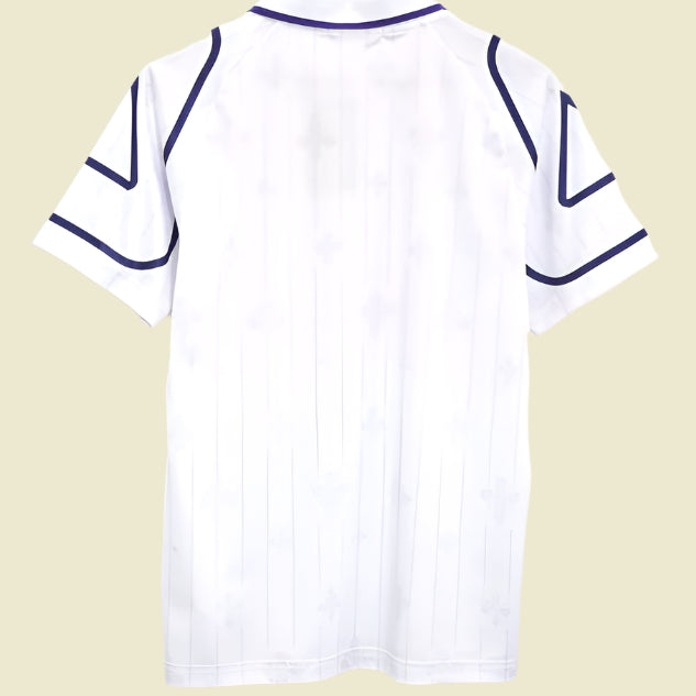 White Fiorentina 97/98 away shirt  on a hanger against a white background