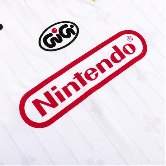 White Fiorentina 97/98 away shirt  with Nintendo logo and other brand logos on a white background