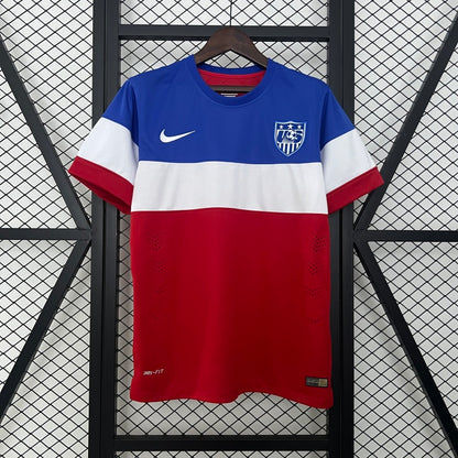 Red, white, and blue USA 2014 away shirt  with Nike logo on a hanger against a grid background