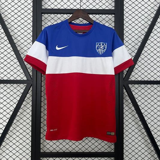 Red, white, and blue USA 2014 away shirt  with Nike logo on a hanger against a grid background