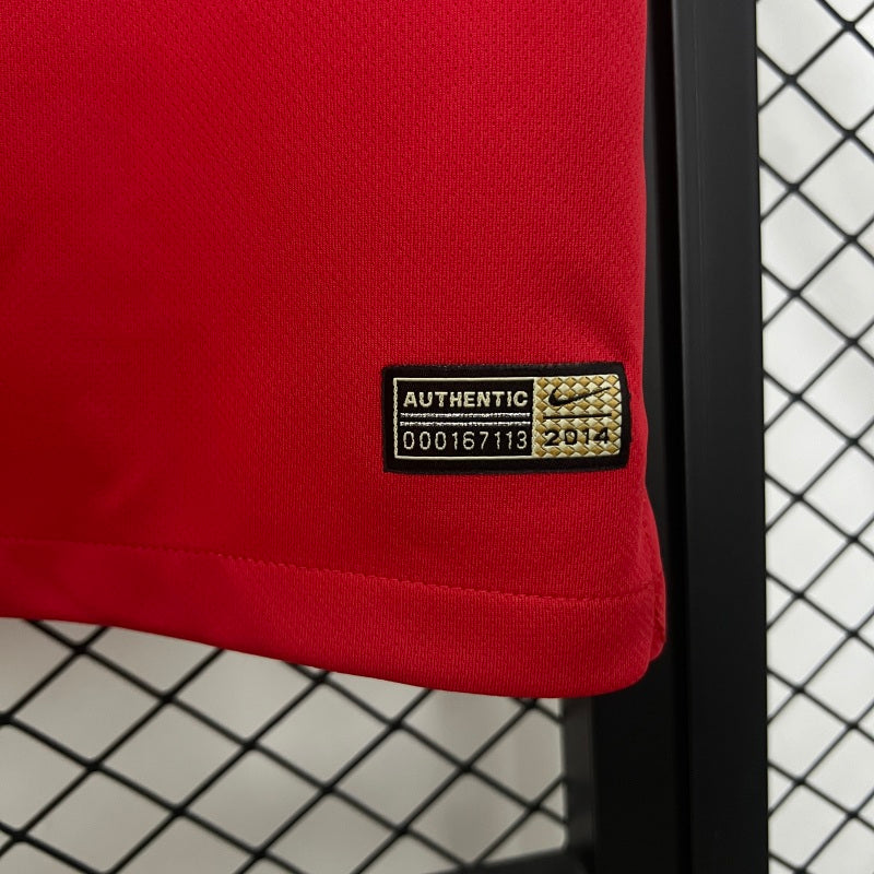 Red USA 2014 away shirt with a visible Nike authenticity label on a grid background