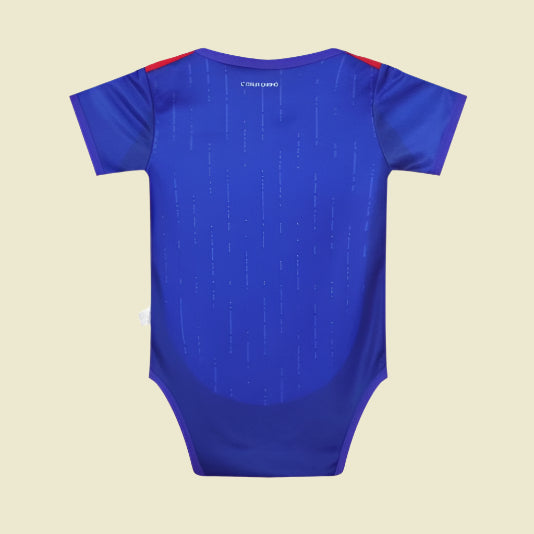 Blue baby onesie with red accents on a white background