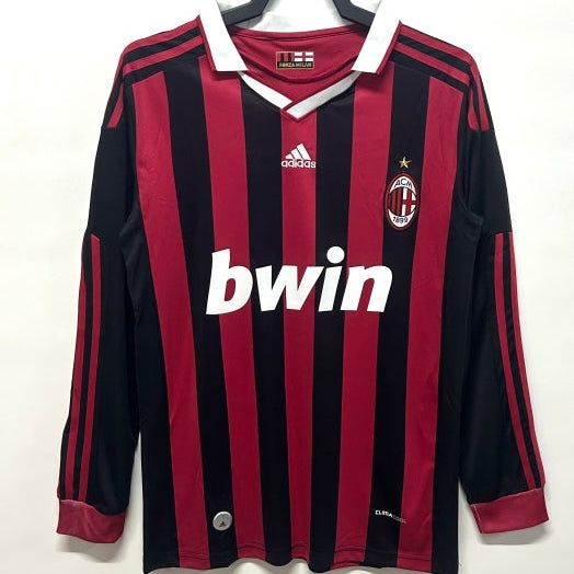 Ac Milan 09/10 long sleeve home shirt  with 'bwin' and Adidas logos on a white background