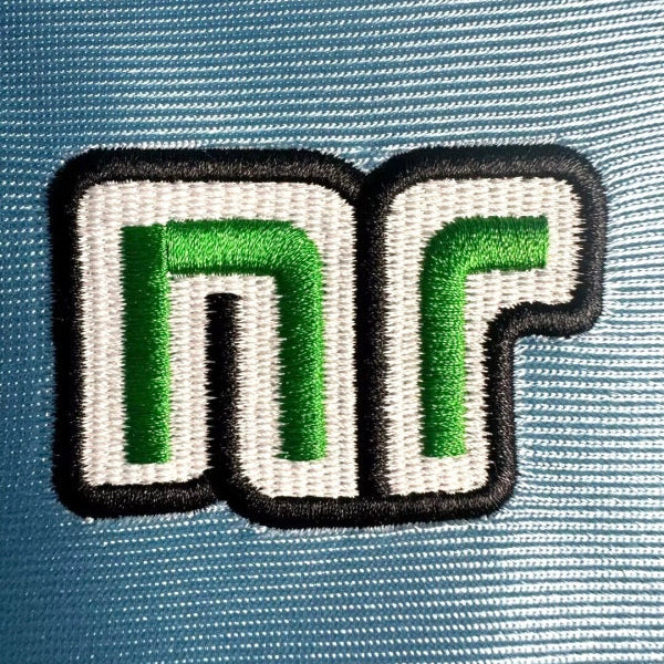 Embroidered logo on a Napoli 90/91 home 2nd shirt