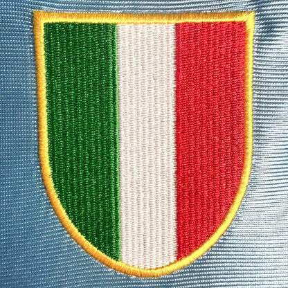 Embroidered patch with green, white, and red stripes on a blue Napoli 90/91 home 2nd shirt